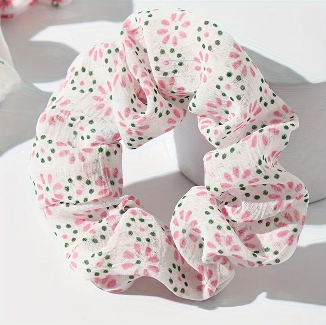 Scrunchies de pelo rosadas