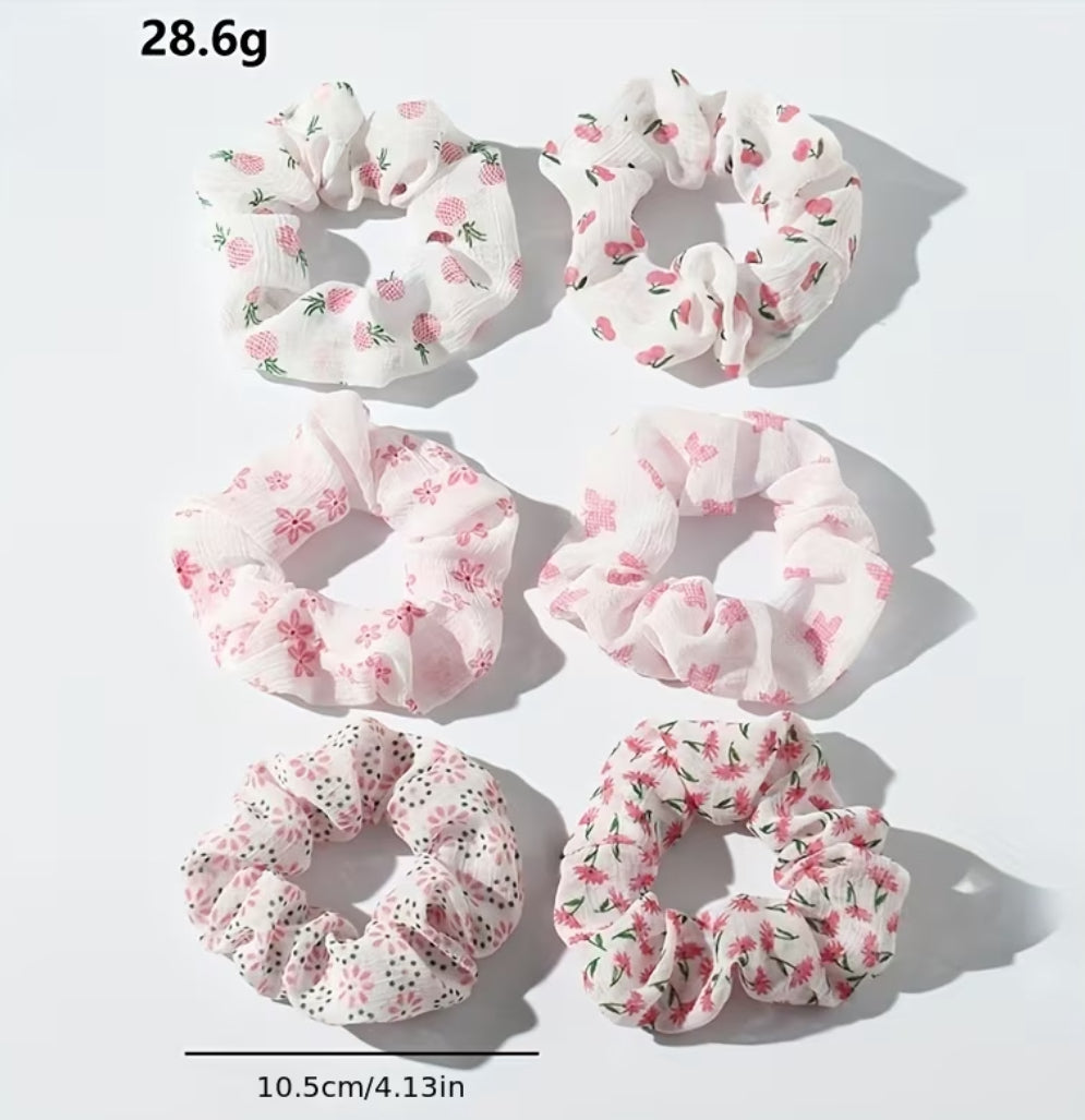 Scrunchies de pelo rosadas