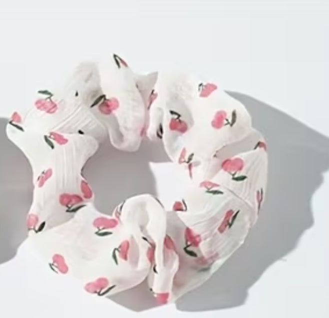 Scrunchies de pelo rosadas